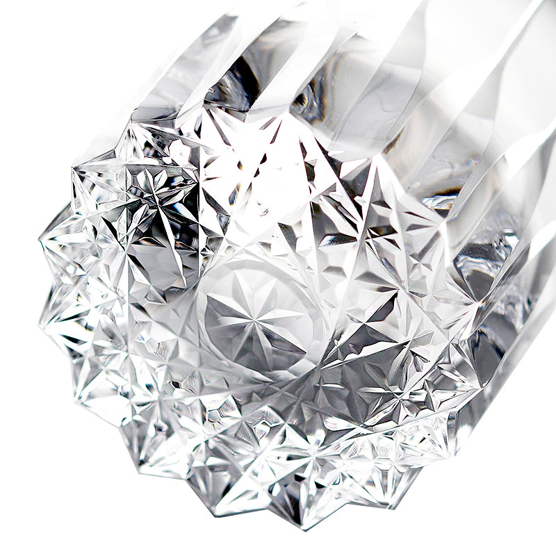Close‑up view of heavy multi‑faceted star carved thick base on hand‑cut drinking tumbler