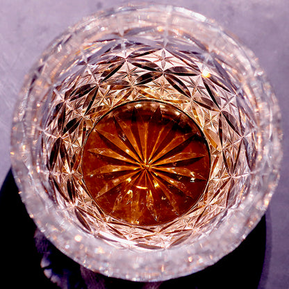 Close‑up of hand‑cut diamond facet carving on K9 crystal tumbler glass